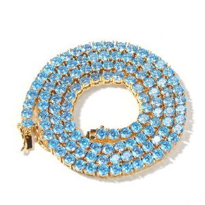 4mm gold tennis chain necklace with light blue round-cut cubic zirconia for men and women