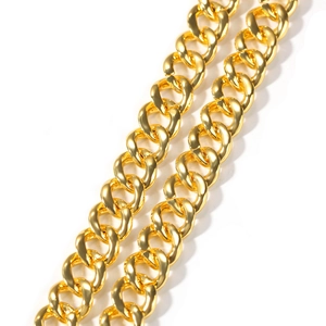 Macro detail of 13mm gold plated Cuban link chain with high polished finish for men