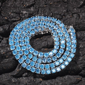 Macro view of 4mm sea blue zircon tennis necklace with silver plated prong setting details