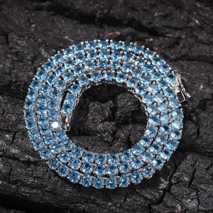 Classic 4mm tennis necklace featuring round cut light blue zircon in silver plating