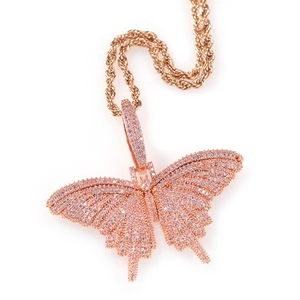 Detail of rose gold butterfly pendant with pink and white pavé cubic zirconia
