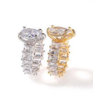Luxurious gold and silver hip hop rings with pear-cut center stone and pave zircon