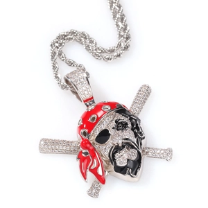 Detail of hip hop pirate skull pendant with red enamel bandana and micro paved cubic zirconia