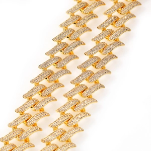 Detail of 20mm gold-plated Cuban link necklace featuring iced-out zircon pave thorns