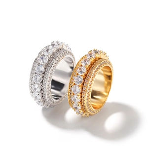 Anello hip hop rotante in oro e argento con zirconi cubici e finitura lucida