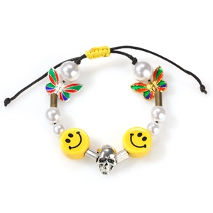 Hiphop bracelet with smiley faces, enamel butterflies, pearls, and a skull on black cord