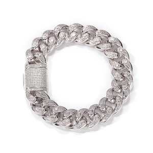Macro shot of 15mm silver Cuban link bracelet with micro-pave zircons and clasp
