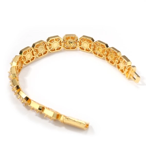Macro shot of 12.5mm gold plated hip hop bracelet with iced out geometric cubic zirconia