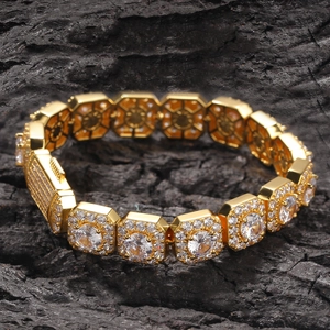 Macro detail of high-quality gold iced-out hip hop bracelet with geometric links