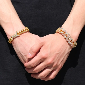 Detail view of hip hop Cuban link bracelets with sparkling zircon and thorn design accents