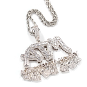 Macro view of silver ATM Money hip-hop pendant with cubic zirconia micro-pave setting