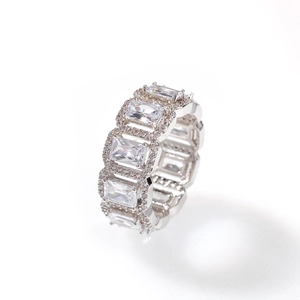 Macro view of silver rectangular zircon ring with luxury pave-set halo diamonds