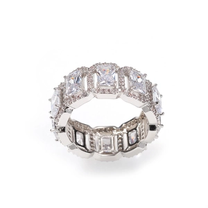 Macro shot of silver-tone eternity ring with rectangular baguette cubic zirconia