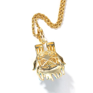 Detail of hip hop earth pendant showing the back hollow grid and colorful gemstones