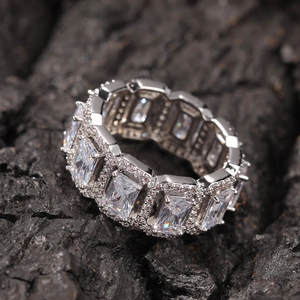Icy silver hip hop ring with emerald cut rectangle zircons and halo setting details