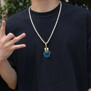 Hip hop golden tennis chain with colorful globe pendant featuring a drip design for men