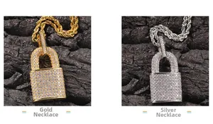 Detail view of hip-hop lock necklaces with zircon pavé in gold and silver finish