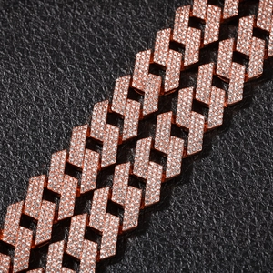Close-up of rose gold Cuban link chain featuring three rows of sparkling white zircons