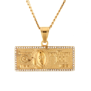 Detailed close-up of a 100 dollar bill gold pendant with sparkling stones on twisted chain