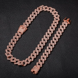 Iced out cuban link chain and bracelet set in rose gold with pave crystals