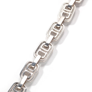 Macro shot of 15mm silver plated hip hop chain links with polished finish and cubic zirconia