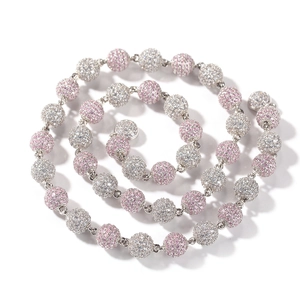 Detail view of pink and white cubic zirconia encrusted beads on a hip hop chain
