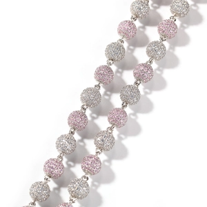 Close-up of pink and silver cubic zirconia micro-paved beads on a hip-hop chain