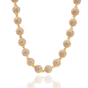 Detail of gold ball chain necklace featuring micro-pave white cubic zirconia stones