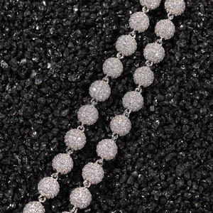 Close-up of hip hop luxury beaded necklace with micro-paved cubic zirconia on black stones