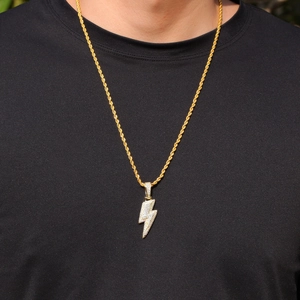 Hip hop lightning bolt pendant with white zircons on a gold twisted rope chain