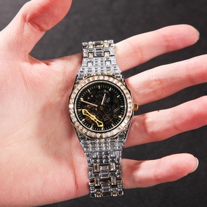 Montre mécanique squelette de luxe pour homme avec strass en finition bicolore or et argent