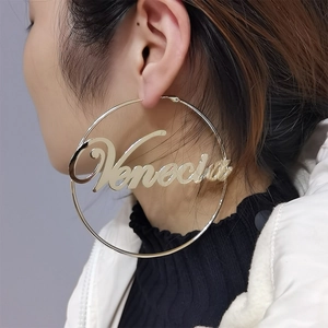 Chic golden hoop earrings for women featuring custom Venecia letter engraving design