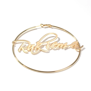 Stylish gold round hoop earrings with personalized RakRiema letter pendant for women