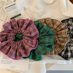 Set of four French retro plaid fabric scrunchies in purple green brown and black
