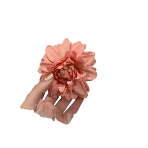 Elegant coral pink camellia hair clip with lace details for beach vacation hairstyles