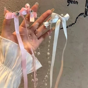 Barrettes à nœuds de style français avec de longs glands en perles rose et blanc