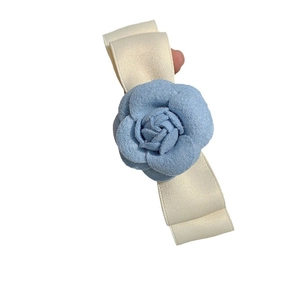 Blue camellia hair clip with French ribbon bow accessory for elegant women hair styling