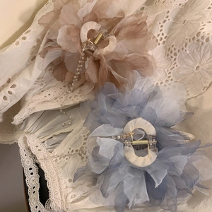 Floral hair claw clips with pearl tassels and layered petals in beige and blue