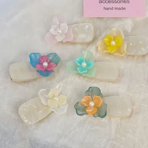 Pack de 6 pinzas para el pelo de acetato macarrón con flores y perlas en lino natural