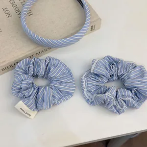 Blue and white striped hair accessory set including headband and scrunchies with lace trim