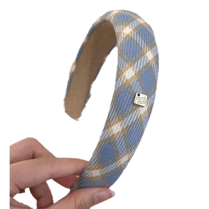 Serre-tête en éponge à carreaux bleus avec logo argenté pour coiffure à crâne haut