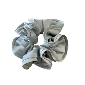 Elegant Morandi blue satin scrunchie with layered ruffles for ponytail styling
