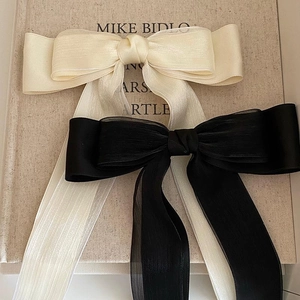 Barrettes à cheveux nœud papillon en mousseline crème et noire avec de longs rubans élégants