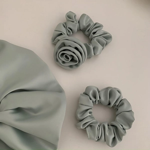 Elegant mint green silk scrunchie set with 3D rose flower detail for women hair styling