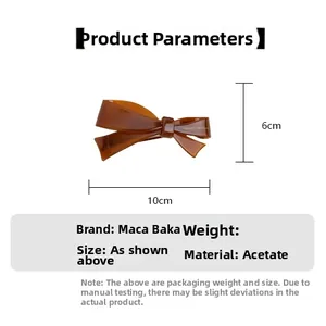 Detailed size specifications for amber acetate bow hair clip showing 10cm length dimensions