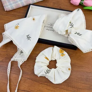 Floral daisy embroidery hair accessories set with lace trim and cream yellow scrunchie