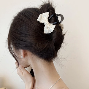 Pince à cheveux noire élégante avec nœud en dentelle blanche pour demi-queue