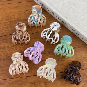 Set of 8 minimalist acetate hair claws in various marble patterns for elegant high ponytails