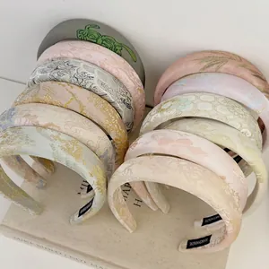 Handmade Chinese style jacquard flower sponge headbands in various elegant pastel colors