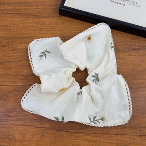 Daisy embroidery scrunchie in cream cotton linen with delicate lace trim